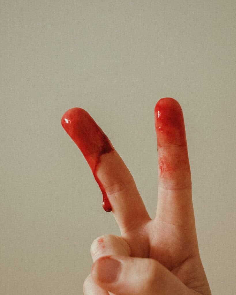 period blood on fingers